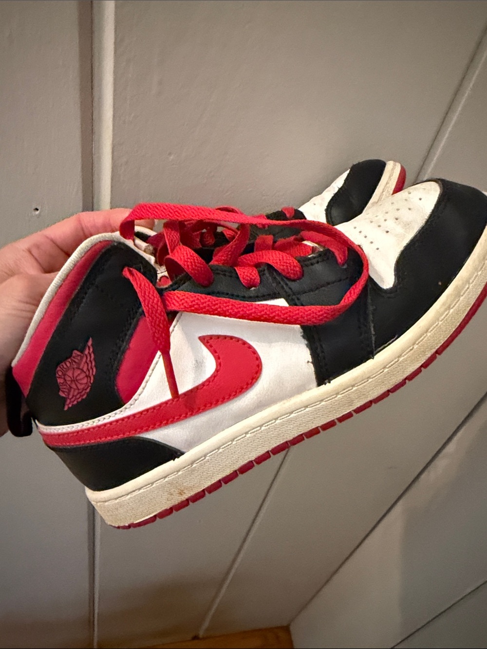Boys Jordan’s mid red black and white sneakers